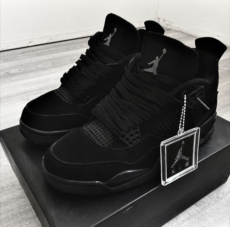 Jordan 4 Retro Mid Black Cat